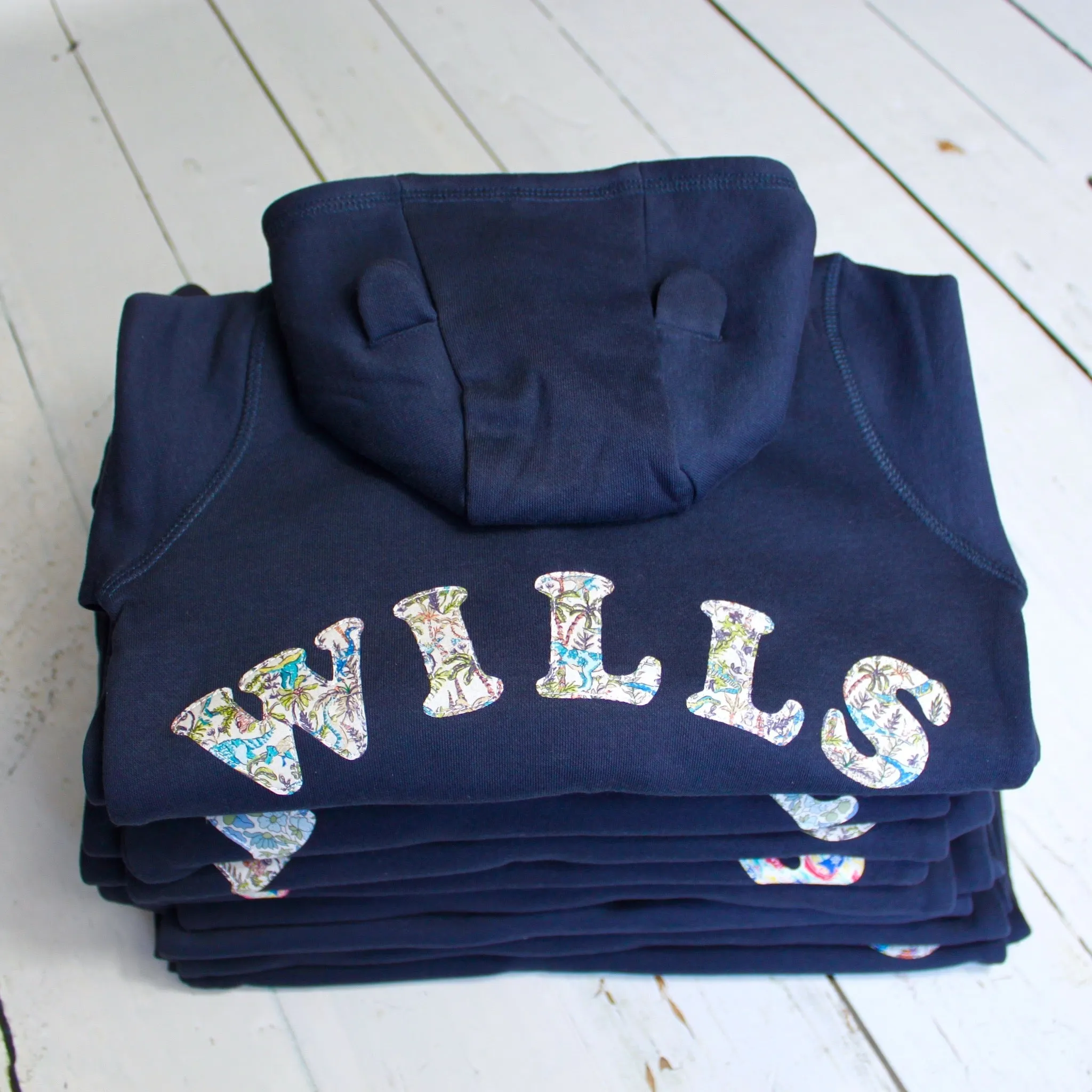 Name onesie with elbow patches