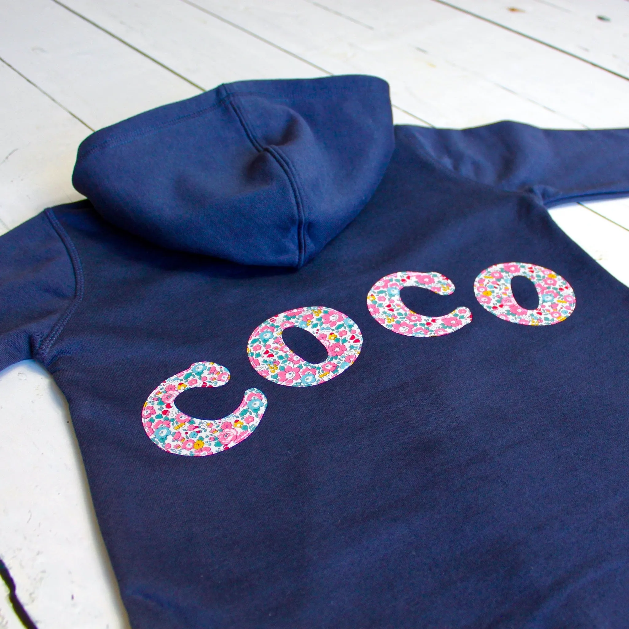 Name onesie with elbow patches