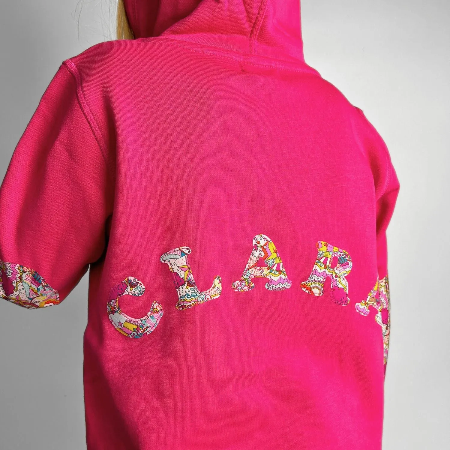 Name onesie with elbow patches