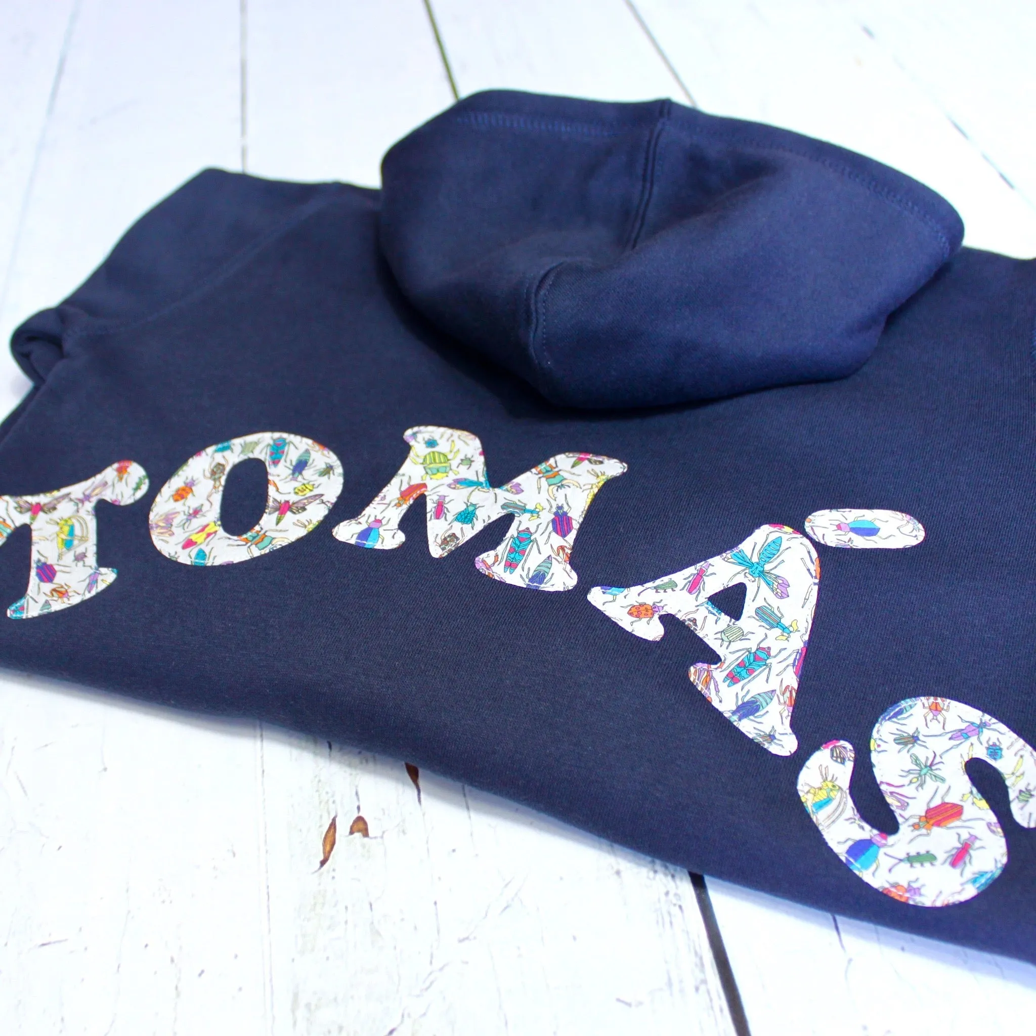 Name onesie with elbow patches