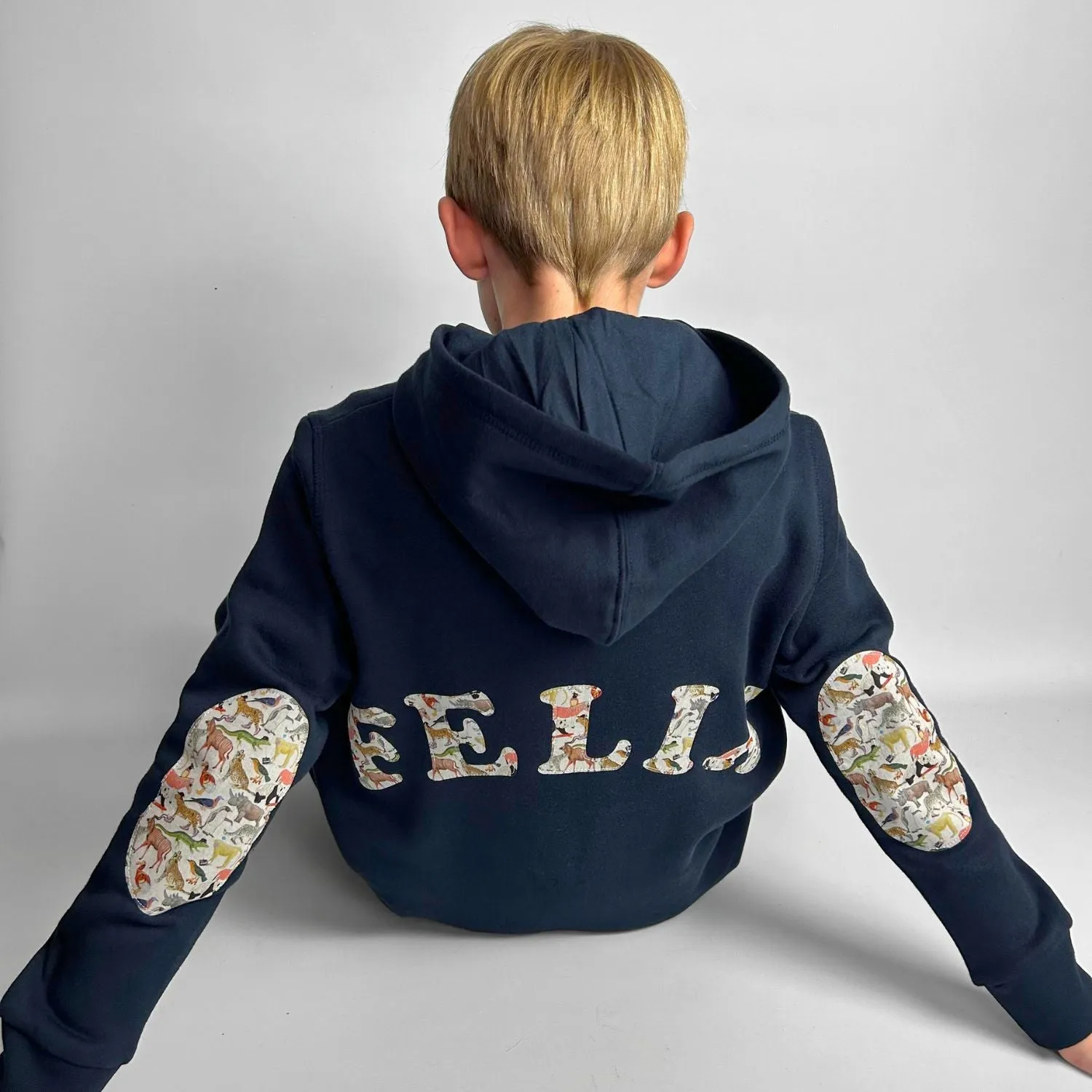 Name onesie with elbow patches