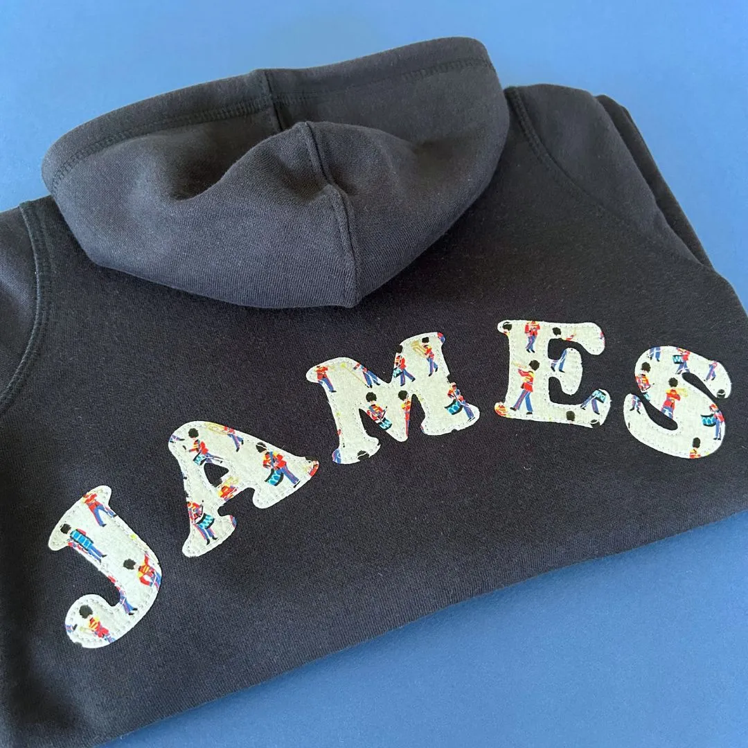 Name onesie with elbow patches