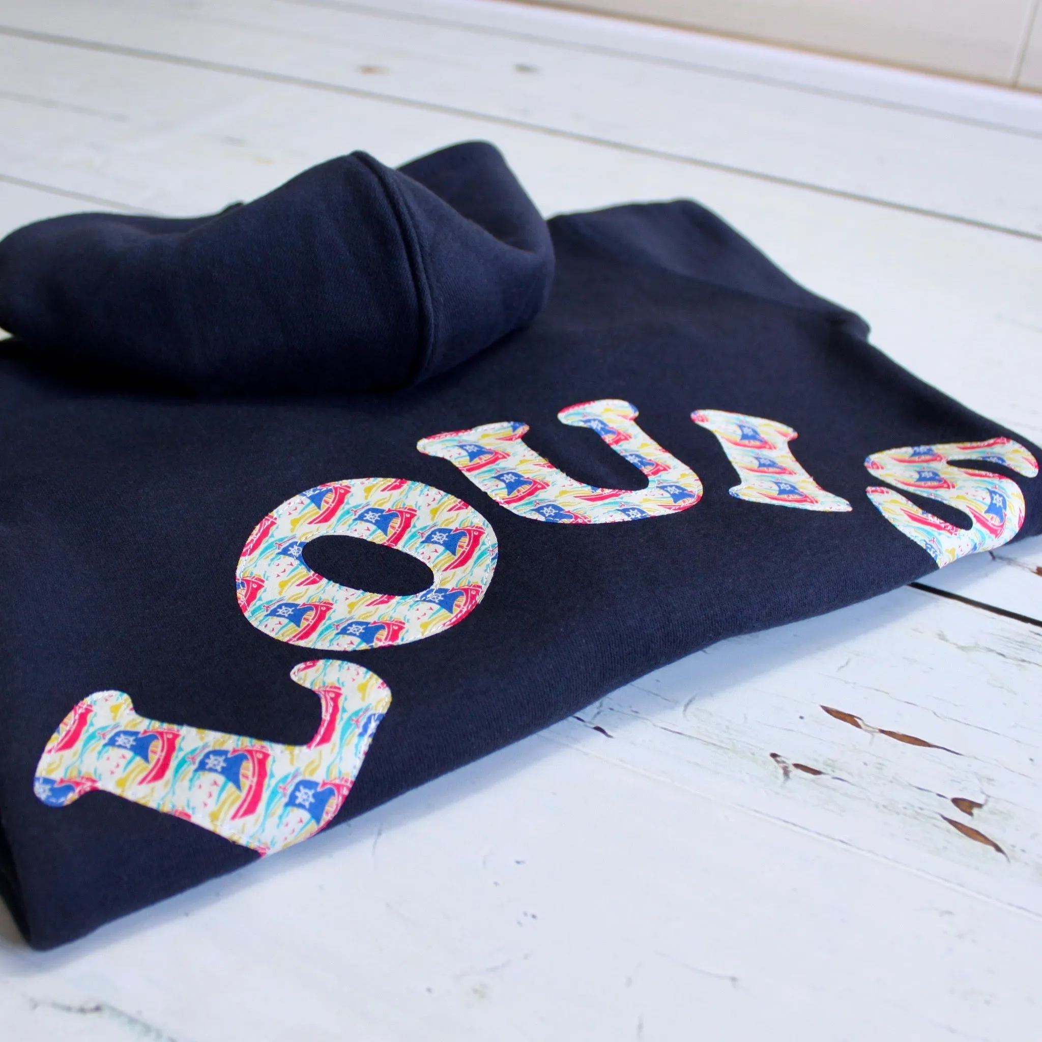 Name onesie with elbow patches
